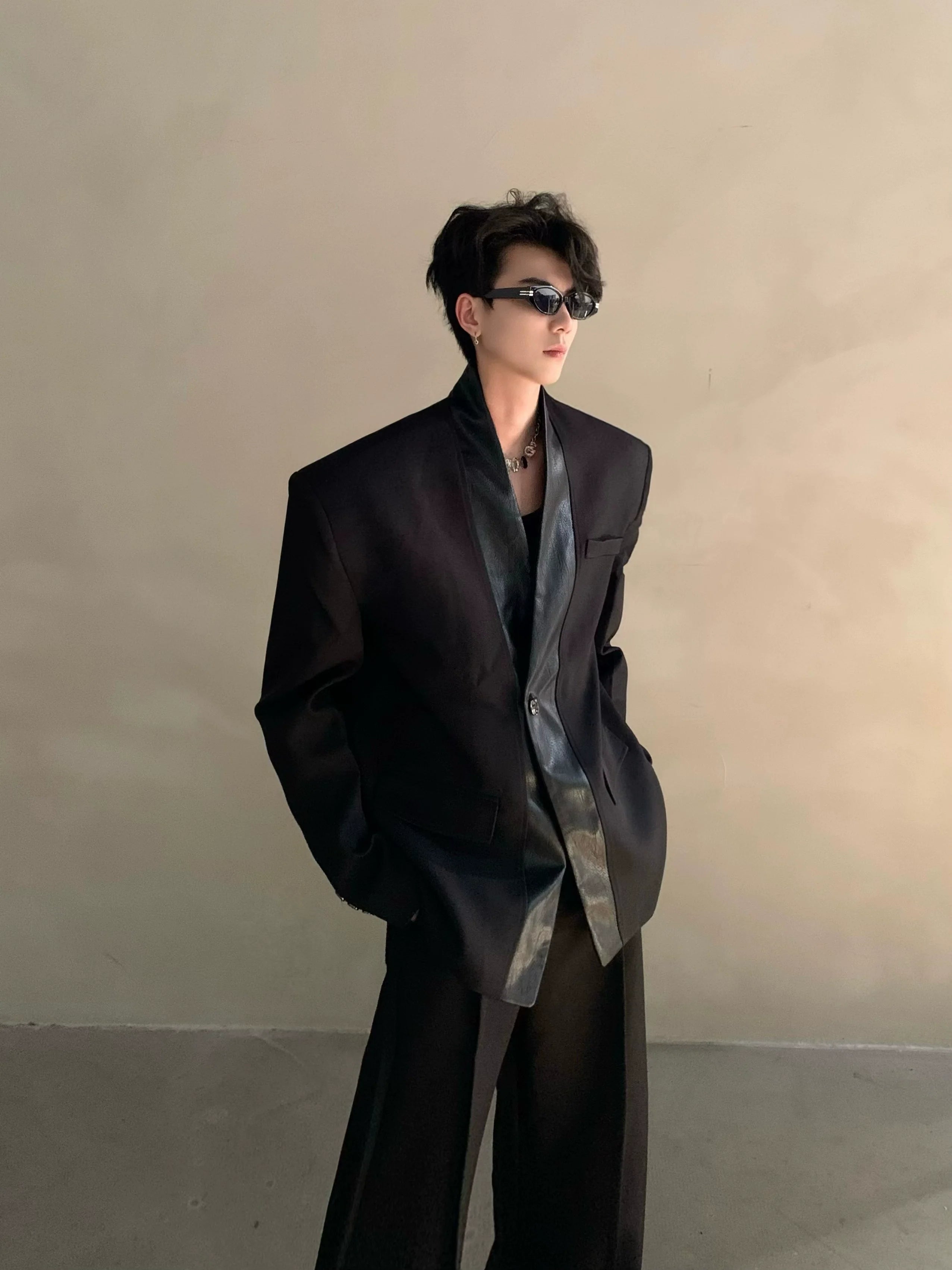 Autumn and winter black collarless suit splicing leather jacket profile shoulder pads light luxury ruffian handsome high-end jacket R004