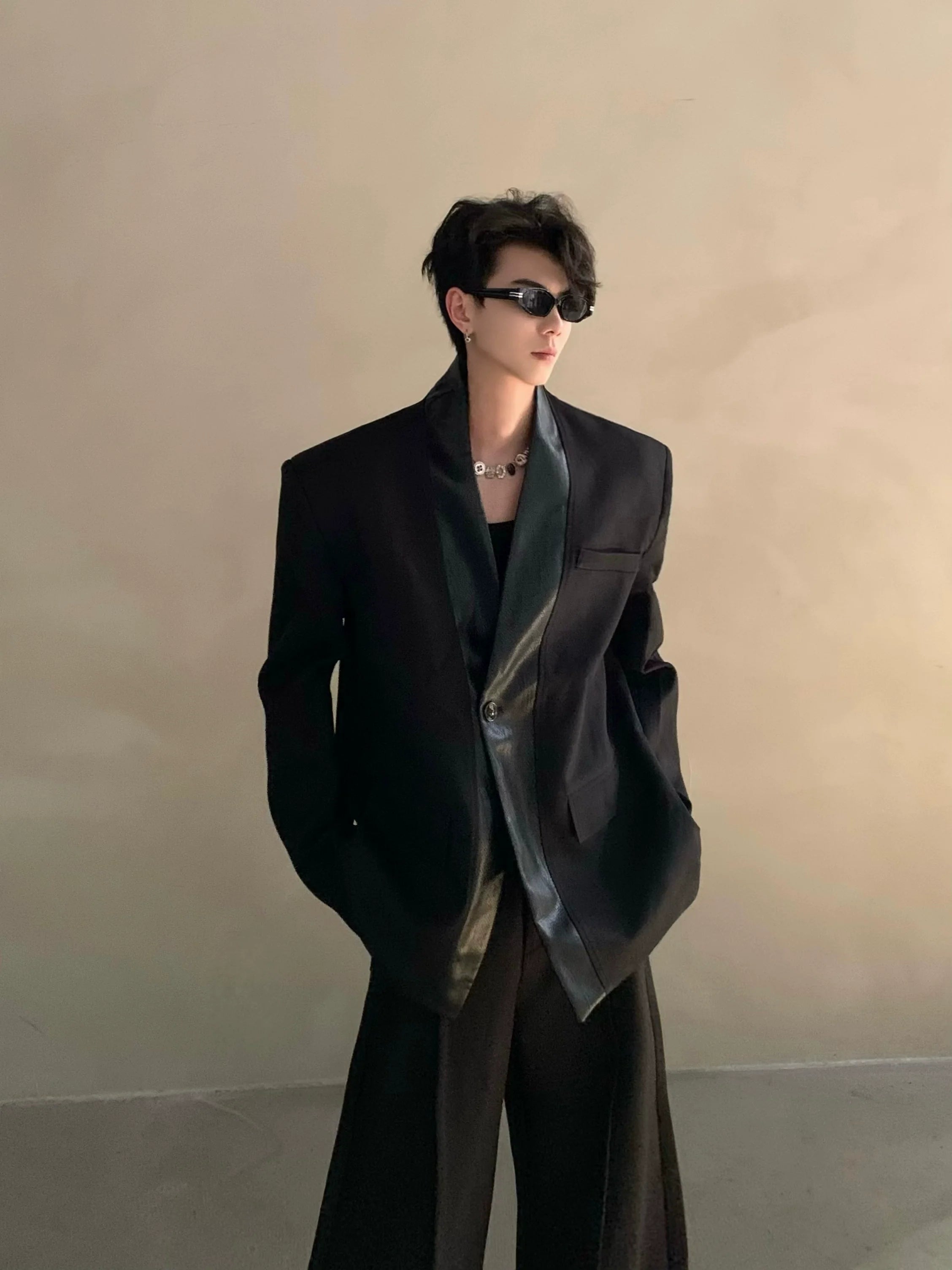 Autumn and winter black collarless suit splicing leather jacket profile shoulder pads light luxury ruffian handsome high-end jacket R004