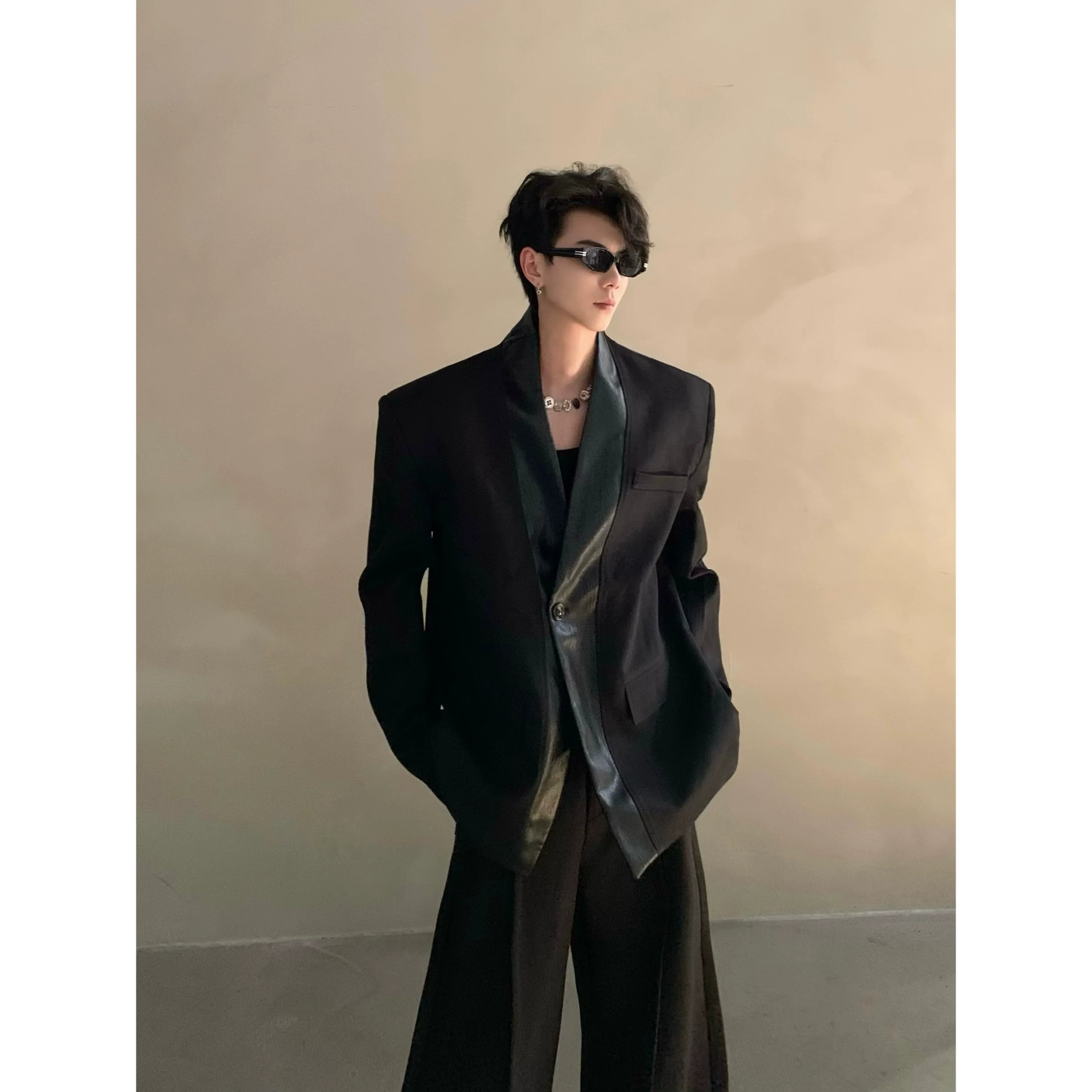Autumn and winter black collarless suit splicing leather jacket profile shoulder pads light luxury ruffian handsome high-end jacket R004