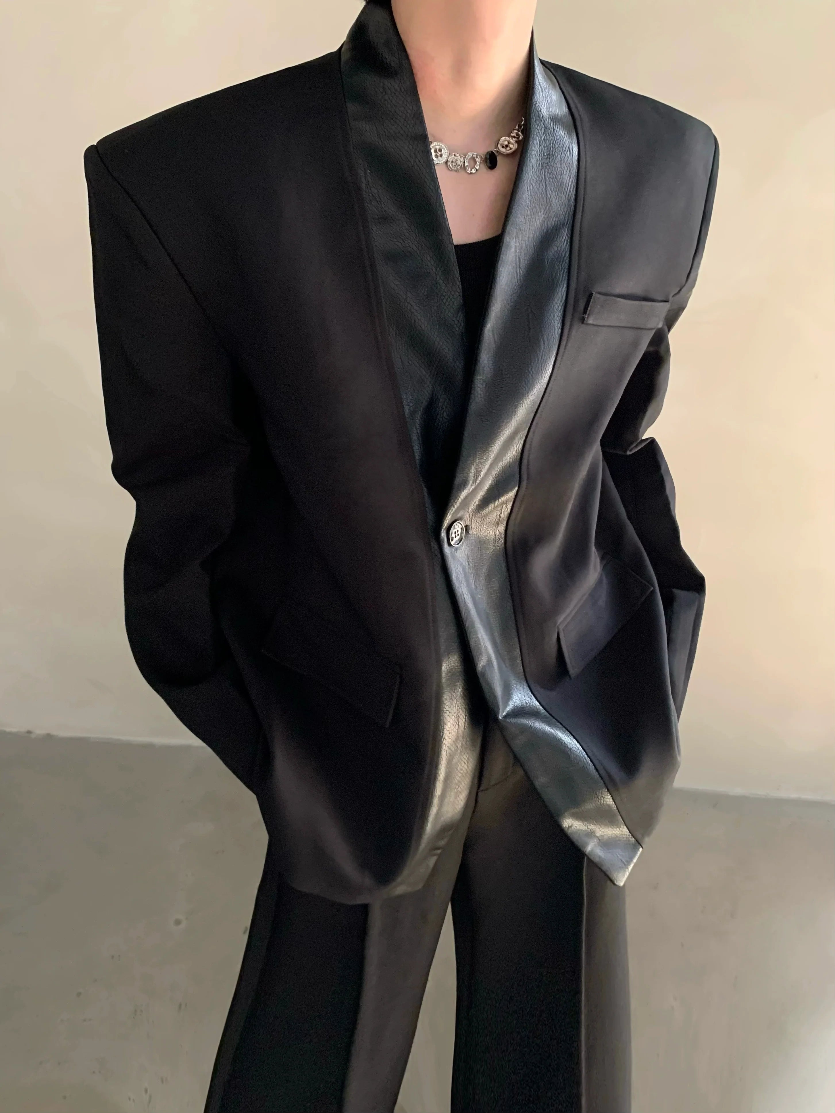 Autumn and winter black collarless suit splicing leather jacket profile shoulder pads light luxury ruffian handsome high-end jacket R004