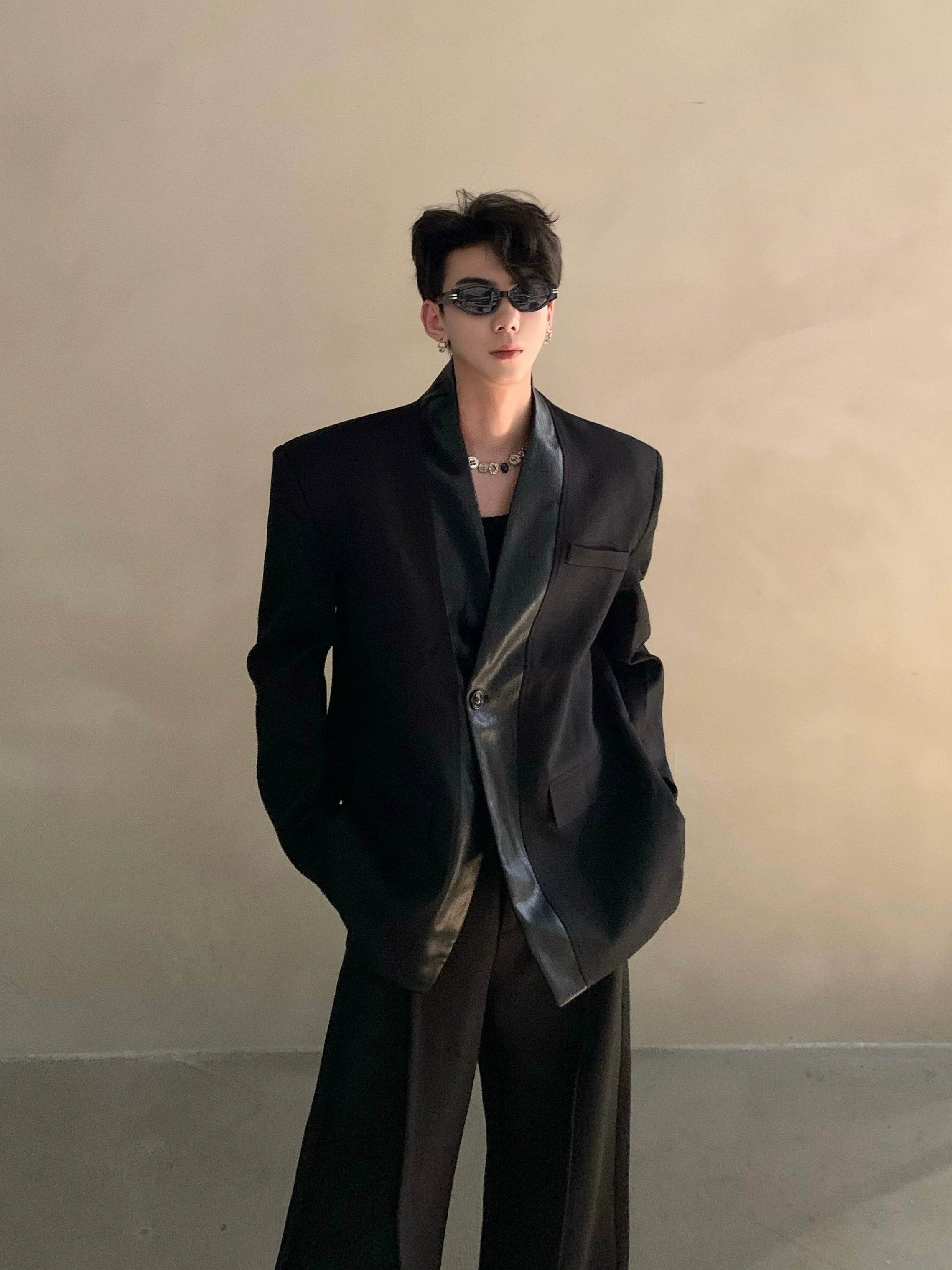 Autumn and winter black collarless suit splicing leather jacket profile shoulder pads light luxury ruffian handsome high-end jacket R004