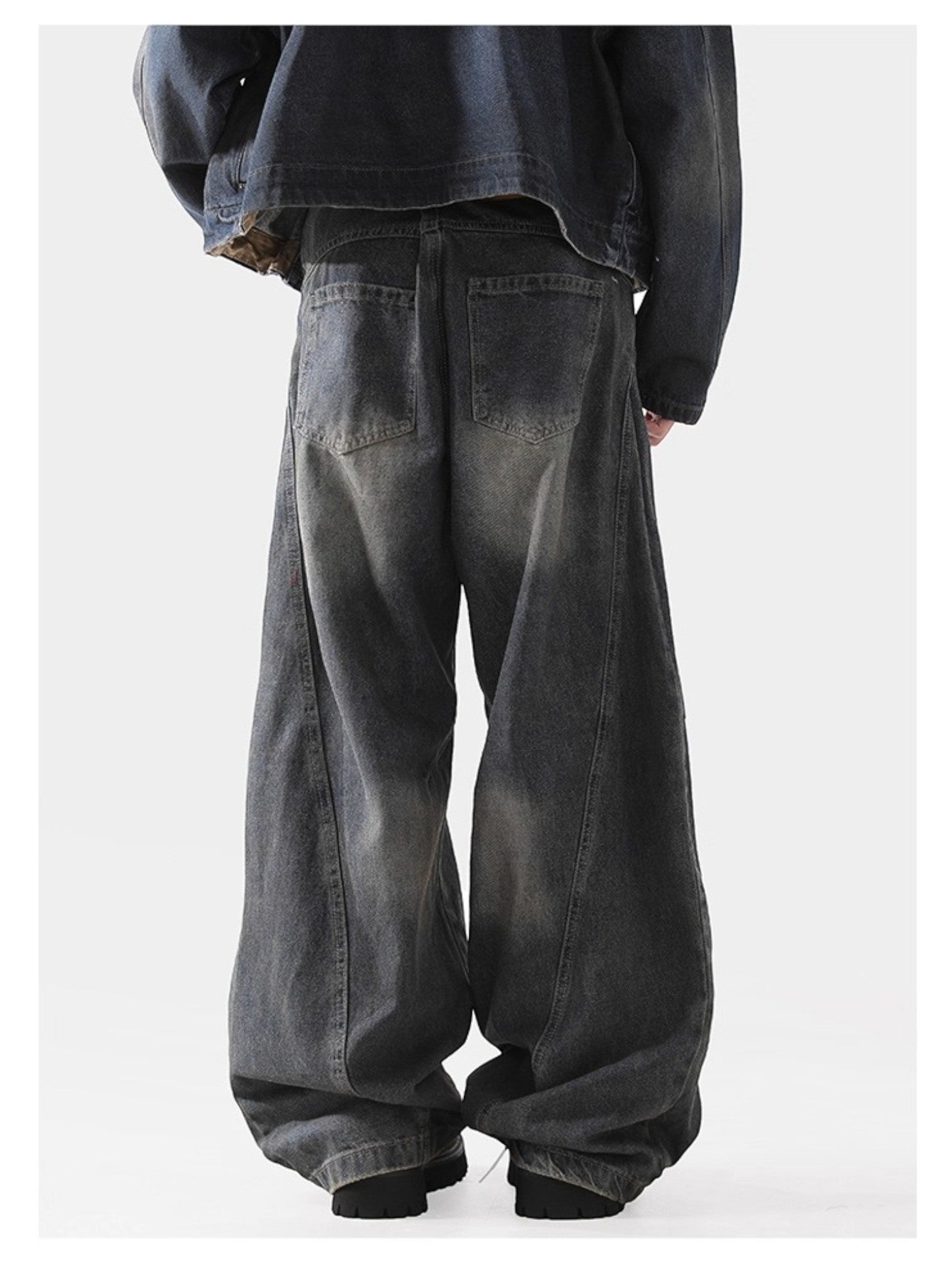 DECONSTRUCTED SABER-CUT JEANS B0187